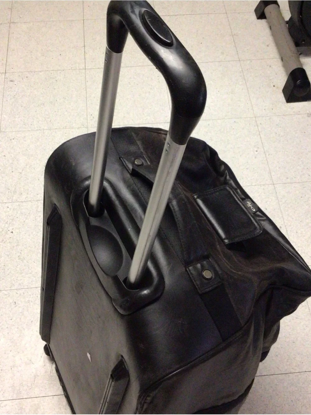 Vtg rare Oakley Black Rolling Duffel luggage with Telescopic Handle. 30X17X15.